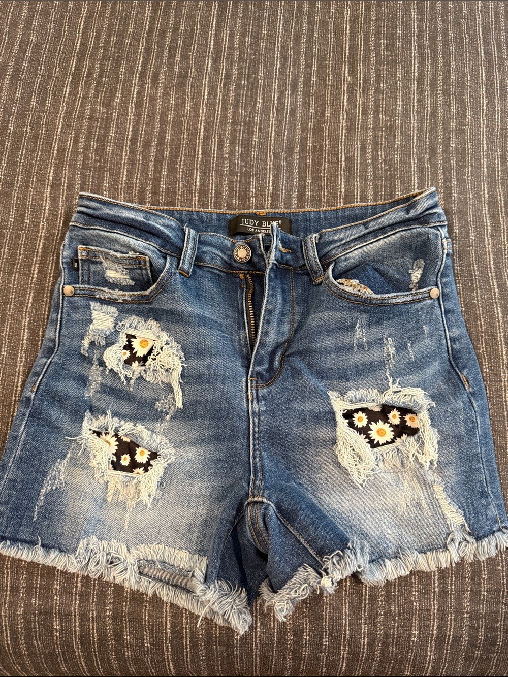 Judy Blue Blue Distressed Denim Shorts with Daisy Patch